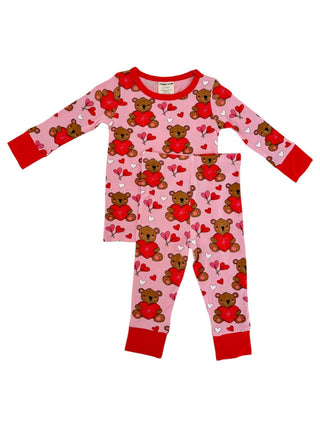 The SpearmintLOVE Long Sleeve 2-Piece Set - Valentine Bear Pink features a cozy childrens pajama set with a pink background and brown teddy bears holding red hearts, complemented by red cuffs and neckline for a snug nights sleep.