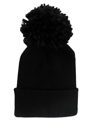 The Bamboo Babys First Hat - Black Pom by SpearmintLOVE is a black knit beanie with a large pom-pom, made from soft fabric. It features a folded cuff for added style and is perfect for those seeking a festive color accent.