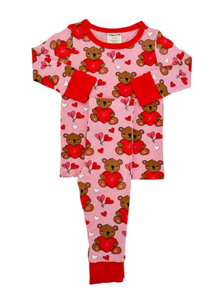 The SpearmintLOVE Long Sleeve 2-Piece Set - Valentine Bear Pink is perfect for kids, offering a soft fabric with a pink and red design. The top and pants feature charming teddy bear and heart patterns, with an elastic waistband for comfort.