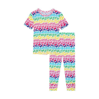 Posh Peanut Girl's Short Sleeve Pajama Set - Rainbow Butterfly | These Sleepies provide comfort and delightful designs for joyful bedtimes.