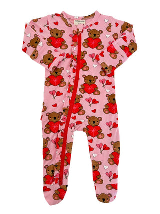 The SpearmintLOVE 2-Way Ruffle Zip Footie in Valentine Bear Pink boasts a buttery soft fabric, teddy bears with red hearts, and small white/red heart patterns. Its 2-way zipper offers convenience, perfect for your little ones cozy dreams.